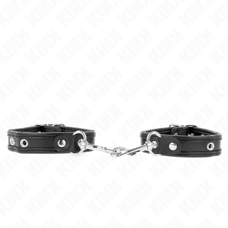 img_189415_5f38e456fe9e1ff683e888b3e8325c43_1.png KINK - MUÑEQUERAS MINI NEGRO CON TACHUELAS AJUSTABLE 16-22 CM X 2 CM - Imagen 1